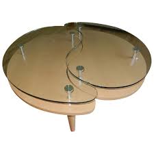 Primary colors in this image include: Custom Yin Yang Contemporary Wood Glass Coffee Table Aptdeco