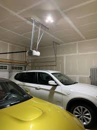 Consider light intensity and color as you move away from fluorescents for garage ceiling lights. Three Leaf Garage Light New Year 50 Discount Ballstraining Garage Lighting Led Garage Lights Garage Light Fixtures