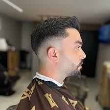 K'orner מספרת גברים ואקדמיה לעיצוב שיער by רון קרן