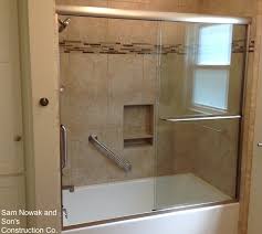 Grab bars are useful in a bathroom modified with a handicapped shower. How To Install Shower Grab Bars Shower Safety Bars