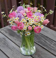 Spring Flower Arrangement With Tulips Hyacinths And Camomile Flowers Flower Arrangements Church Flower Arrangements Spring Flower Arrangements