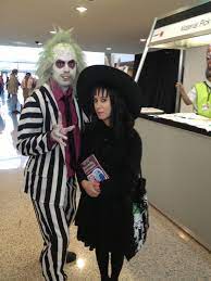 Lydia deetz is the moody, angst ridden teen daughter in the beetlejuice movie and tv series. A Fan Favorite Beetlejuice Lydia Animeexpo Costume Amazing Note Handbook For Th Tim Burton Halloween Costumes Halloween Party Kids Beetlejuice Costume