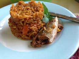 Close the lid of the cooker, plug the cooker in, and press the switch to turn it on. Concoction Rice With Mackerel Fish Top Nigerian Food Blog