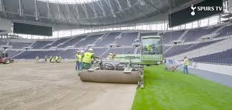 The new tottenham hotspur stadium has a field that moves away to reveal an artificial surface below that's perfect for hosting concerts and american football. Tottenham Hotspur Lays Pitch At New Stadium Stadia Magazine