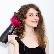 Diffusers help to soften air flow, evenly dispersing it over a larger area of hair. How To Use A Diffuser On Curly Hair 5 Tips For Blowdrying Perfect Curls