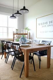 She describes the new color palette as providing an illuminating effect, like turning on a light switch, and we're keen to agree. Modern Farmhouse Dining Room Makeover Sawdust 2 Stitches