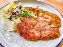 (cotlet de porc, cașcaval, făină, ou, pesmet). Specialitati Din Carne Restaurant Teatris Galati