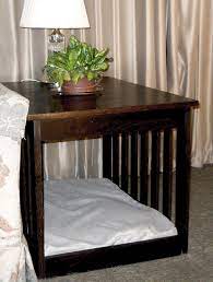 Diply had a whole bunch of cool pet beds featured, but this one made out of an old hollowed television set side table transformed into a pet bed with miniature curtains. Dog Bed End Table