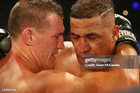 Justin Hodges punches Rob Baron during the Star of the Ring III... News  Photo