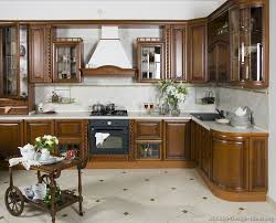 It is characterized by a medium brown color with golden undertones. Italian Kitchen Design Traditional Style Cabinets Decor Italian Kitchen Design Kitchen Cabinet Styles Kitchen Design