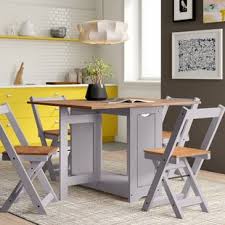 It's versatile and contemporary style lend itself to any decor and will blend well with existing pieces. White Table And Grey Chairs Wayfair Co Uk