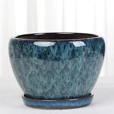 With their ability to enhance the scenery of your outdoor space, large pots can be just as important as the plants themselves. Kouintl European Peacock Blue Flower Pot Ceramic Extra Large High Living Room Outdoor Balcony Personality Green Plant Pot Home Indoor Balcony Green Plant Pot With Tray 1 0kg Buy Online In Bahamas At