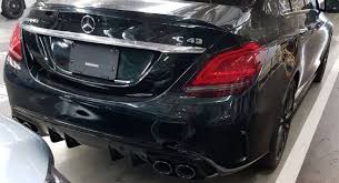 Facelifted 2019 Mercedes Amg C43 Spotted Undisguised With More Aggressive Rear Carscoops Amg Mercedes Amg Mercedes