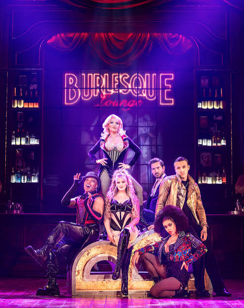 Review of 'Burlesque': “Christina Aguilera's West End baby brings a lush  array of visuals but poor storytelling” – First Night Magazine