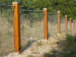 Cedar is chosen because it is naturally bug and rot resistant. Hog Panel Fence Clips Fence And Gate Ideas Installing Wire Hog Panel Fence Cattle Panel Fence Panel Fence Rustic Fence