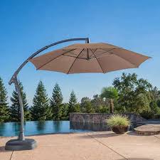 These umbrella stands for the balcony are usually designed to save space. Outdoor Patio Umbrellas Sun Shade Sails Costco