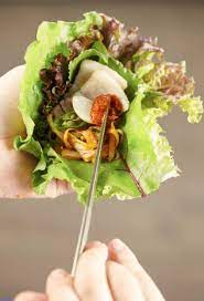 Sprinkle sesame seeds over chicken. Ssam Wikipedia