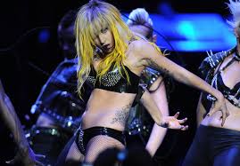 Lady gaga just got two brand new tattoos,. Lady Gaga Flower Tattoo Lady Gaga Body Art Looks Stylebistro