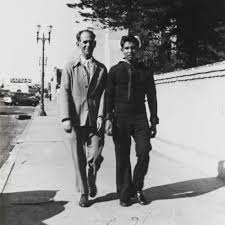 Steven Blanco, son of Bertha and Joe Blanco, in uniform (right) and Mickey  Hambrey (left) in front of the Old Mission San Buenaventura : 1945 —  Calisphere
