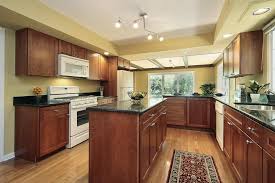 Cherry wood cabinets from crystal kitchen + bath feature a warm, color that intensifies when exposed to light. 43 Kitchens With Extensive Dark Wood Throughout Home Stratosphere