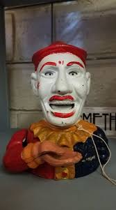 Starkie's, a coin swallower with wiggly ears, and eyes that roll back. Made  of Aluminum patented 32536, from the 1950's. This is a great for an entry  level collector to start collecting