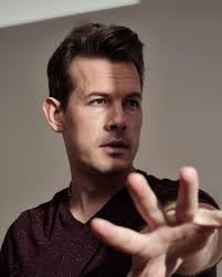 Close-Up Shot of a Man in Gray Turtleneck Sleeves · Free Stock Photo