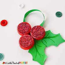 Download Homemade Milk Cap Holly Ornaments Christmas Kids Craft PSD Mockup Templates