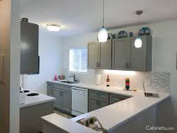 Add Gray Cabinets In Your Kitchen With Colonial Ii Maple Willow Gray Cabinets Grey Kitchen Cabinets Warm Grey Kitchen Kitchen Cabinets