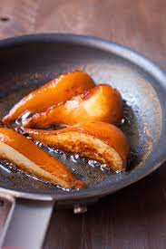 Caramelized Pears With Butter Rum Sauce Macheesmo Recipe Pear Dessert Recipes Recipes Pear Recipes