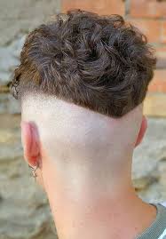 With some practice and the right tools, you can trim carefully with a pair of clippers or styling scissors as you work your way from the sides to the back and top. 15 Hot V Shaped Neckline Haircuts For An Unconventional Man