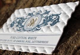 The smiley is more than a smiley, it's also the d from the company name. 3d Embossed Business Cards Online Inktank Printing