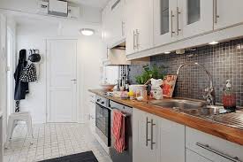 The rug lends a punch of room brightening colors that personalize the space. 23 Beautiful White Scandinavian Kitchen Designs Kitchen Design Small Kitchen Designs Layout Scandinavian Kitchen Design