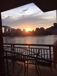 sun set over ohio river from the chart house restaurant