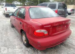 Image result for Cardinal Red 1999 Hyundai