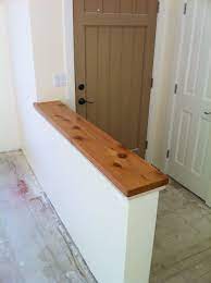 The easy way to cover an unsightly knee or pony wall using wood. Pony Wall With Alaskan Cedar Cap Separates Entry From Living Room In Small Santa Cruz House Cedar Finished With La Pony Wall Half Wall Room Divider Half Wall