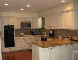 The spacing of the room, from the tops of cabinets to the ceiling, will contribute to the balanced look of the kitchen. Stunning Kitchen Soffit Ideas Kitchen Soffit Ideas Soffit Above Kitchen Cabinets 5319 Kitchen Kitchen Soffit Above Kitchen Cabinets Bulkhead Kitchen