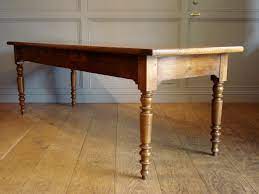This is a delightfully large antique industrial mill table, with copious decorative character. Sold 19th Century Oak Walnut Farmhouse Table Antique Dining Tables