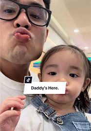 Daddy's Kiss Brings Comfort and Joy