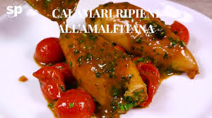 The dish utilizes the whole body of the spear squid that has been stuffed with various ingredients and then thickly cut. Calamari Ripieni All Amalfitana Youtube