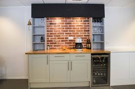 Use matching style and finish as the rest of the kitchen cabinets so that your kitchen office nook blends in. Workplace Kitchen Fit Out Office Tea Points London Kent Surrey Sussex