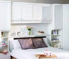 Amazing Storage Above Bed Ideas Creative Modern Designs Bedroom Wall Storage Sfwiz Co Us Furniture And Home Modern Bedroom Design Bedroom Design Bedroom Wall