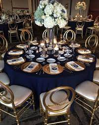 Place the silverware on the. Pin By Shelley On Wedding Navy Blue Navy Blue And Gold Wedding Blue Gold Wedding Gold Reception Decor