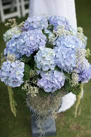 Steel Blue Potted Hydrangea Ceremony Decor Designed By Engaging Events Blue Flowers Bouquet Wedding Flower Arrangements Wedding Flowers