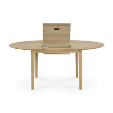 Once you have selected the right extension dining table for your space, explore other items that can enhance this room. Oak Bok Round Extendable Dining Table