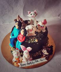 Get birthday cake for daughter with name and photo. Choco Liiicious Chocolate Flavoured Cake For A Birthday Celebration For Someone Who Has A Cat Squirrels And Rabbits And The Figurines Showcase The Mother Daughter Duo To Place An Order For