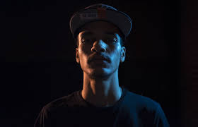 Maybe you would like to learn more about one of these? Hd Wallpaper Man In Black Crew Neck Top Photo Man Wearing Hat With Plain Black Background Wallpaper Flare