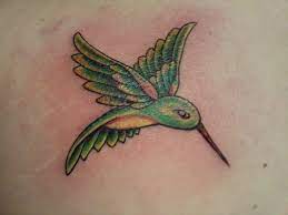 Hummingbird Tattoo By Dougie Lefty S Tattoo Company Colorado Springs Hummingbird Tattoo Tattoos Maple Leaf Tattoo