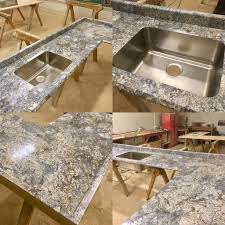 Large gray and blue mineral deposits lay in a white bedrock. Azul Aran 180 Degree Fx Radiance Finish Ogee Ideal Edge Karran Stainless Steel Under Mount Sink Bowl Rolled Back Sink Bowl Countertops Kitchen Countertops