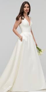 High neck wedding dresses run a wide range, with dress necklines skimming collarbones to circling the entirety of the neck. Amazing Satin V Neck Neckline Natural Waistline A Line Wedding Dress With Pockets Wtoo Wedding Dress Wedding Dress With Pockets Watters Wedding Dress