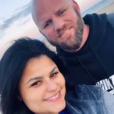 Elishua Brown, summer intern for Kanawha County Clerk Vera McCormick, was  surprised this morning by a visit from Denise Brindley, business teacher  from Capital High School, to present him with a certificate